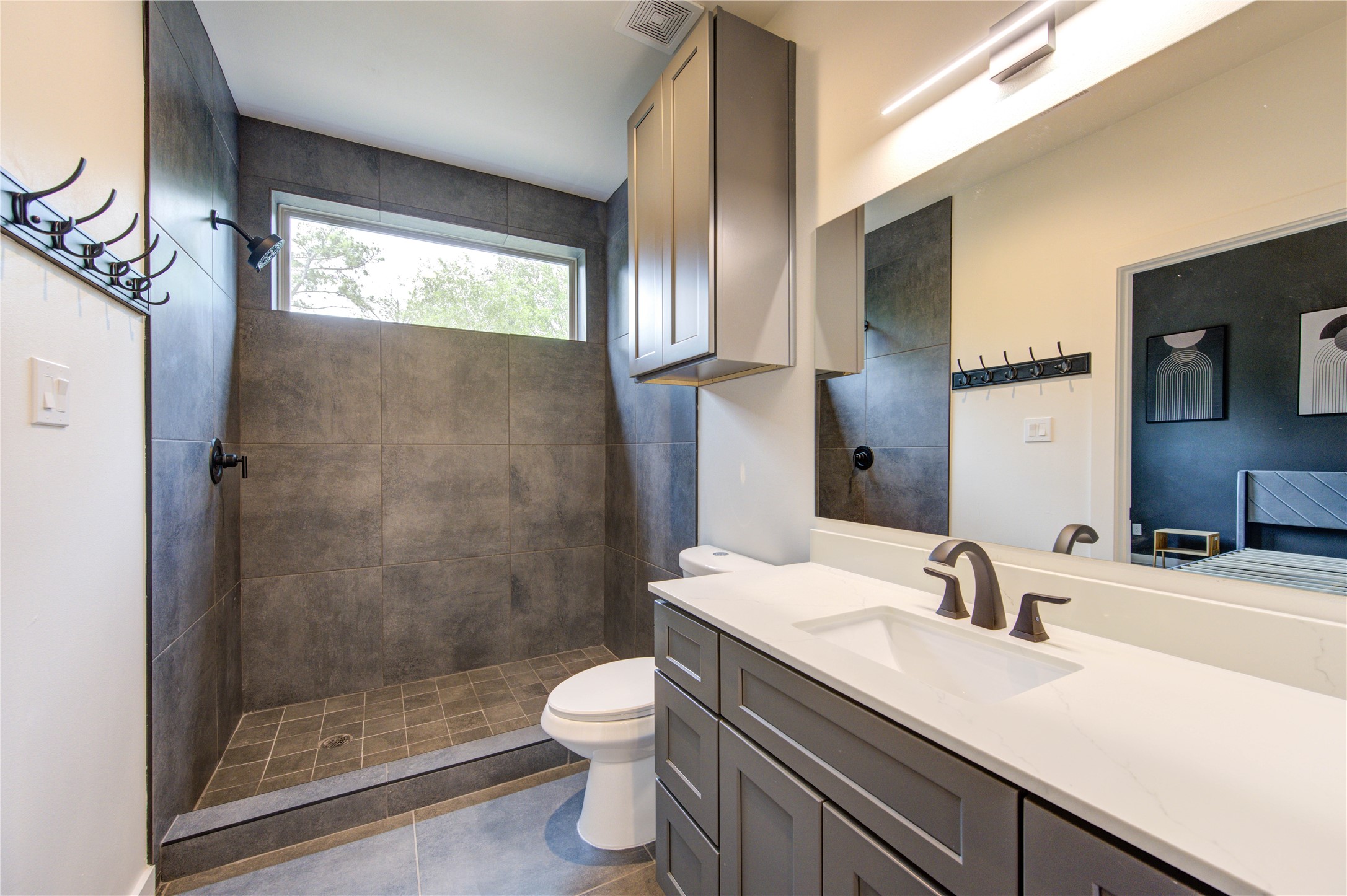 13106 Beauty Berry Ridge Lane Cypress, TX 77429 - Photo 11 of 24 a bathroom with a sink a toilet and shower