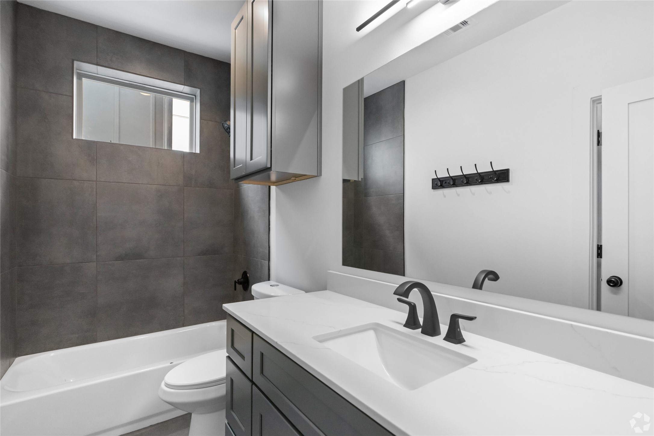 13106 Beauty Berry Ridge Lane Cypress, TX 77429 - Photo 15 of 24 a bathroom with a sink toilet and shower