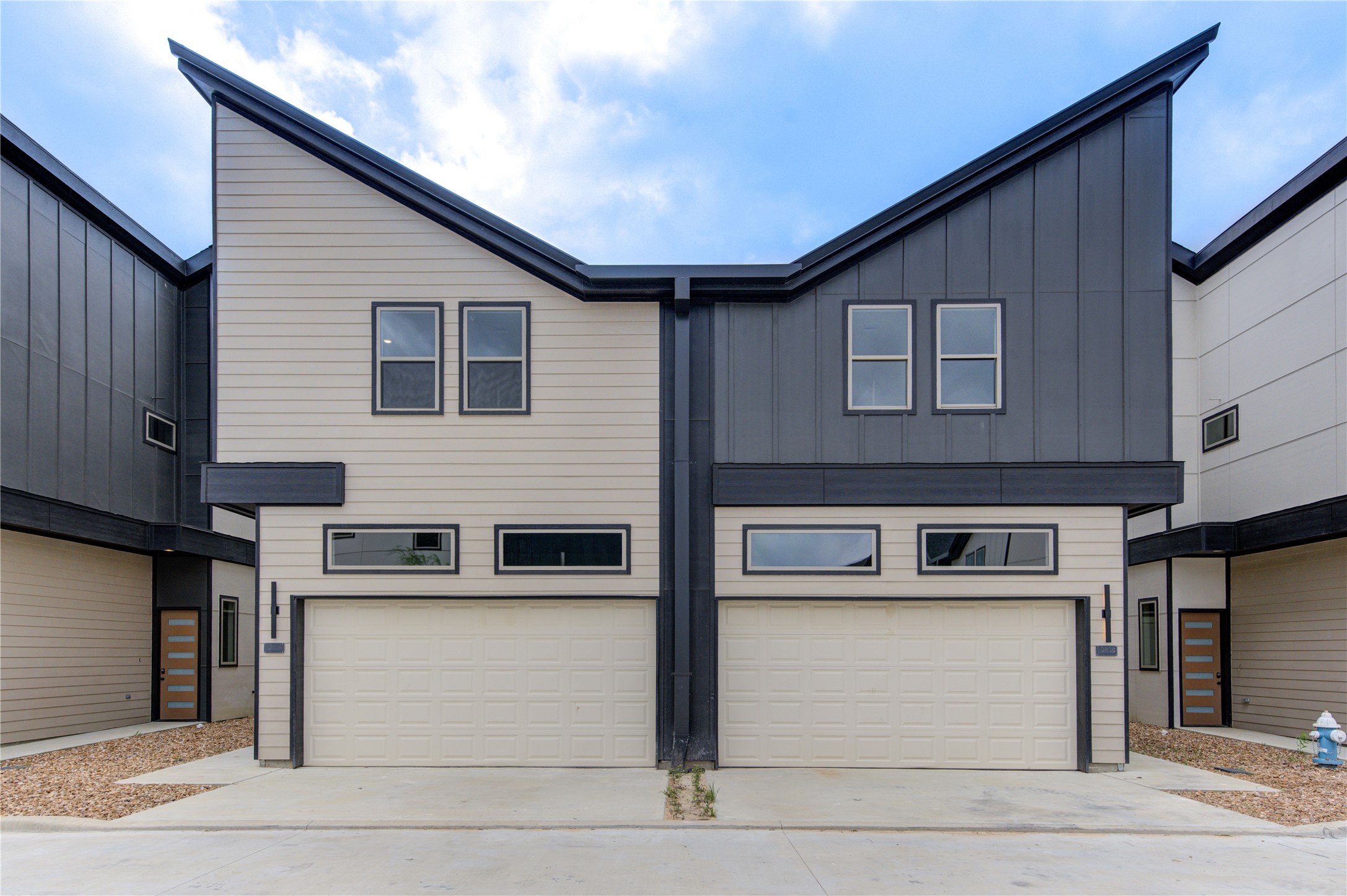 13106 Beauty Berry Ridge Lane Cypress, TX 77429 - Photo 24 of 24 a view of a building with a door and a refrigerator