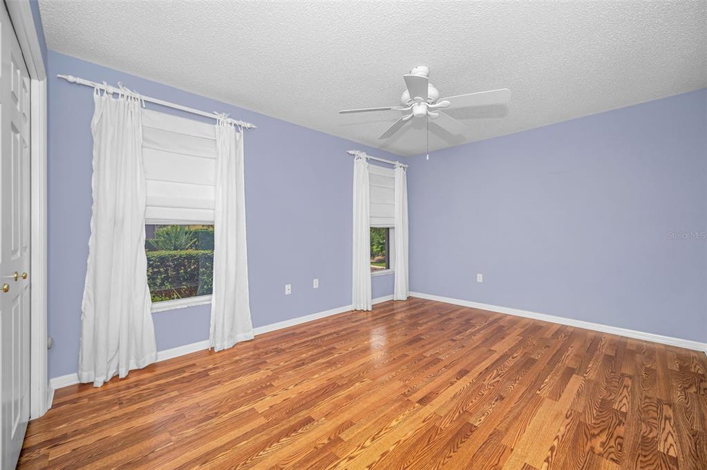 11917 Hadleigh Way Trinity, FL 34655 - Photo 33 of 84 a view of empty room with window and ceiling fan
