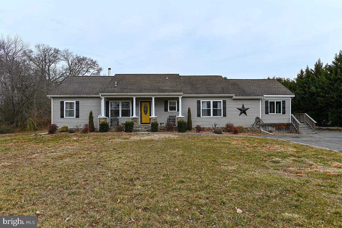 368 Almond Road Pittsgrove, NJ 08318 - Photo 1 of 40 a front view of a house with a garden