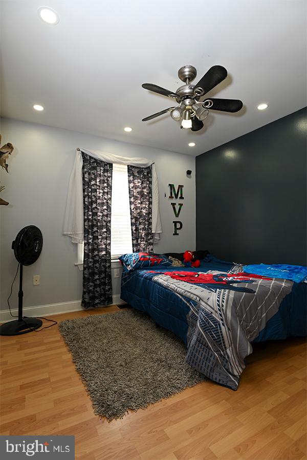 368 Almond Road Pittsgrove, NJ 08318 - Photo 14 of 40 a living room with a couch and a chandelier