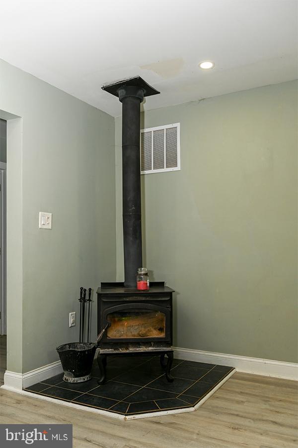 368 Almond Road Pittsgrove, NJ 08318 - Photo 24 of 40 a room with a piano and wooden floor