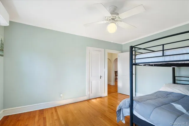 a bedroom with a bed and closet