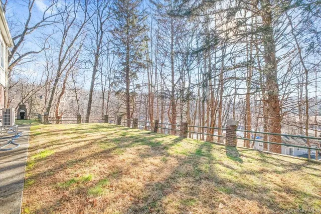 a view of a building with snow on the road