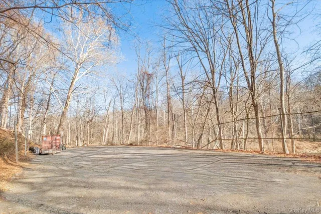 a view of a backyard of the house