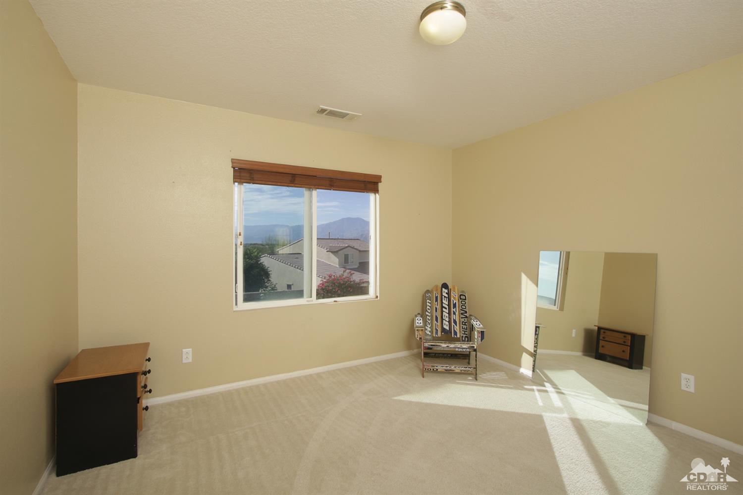 82785 Mount Riley Drive Indio, CA 92203 - Photo 27 of 35 a living room with furniture