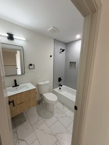 a view of a hallway with entryway