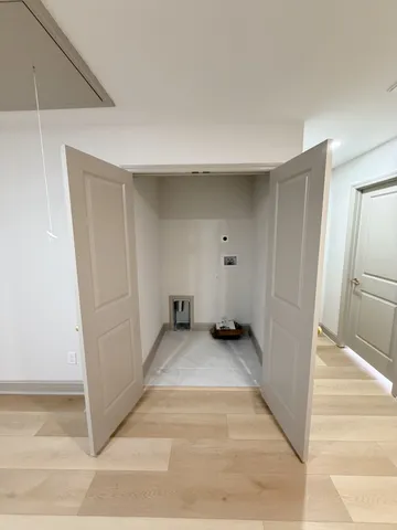 a bathroom with a toilet a sink and bathtub