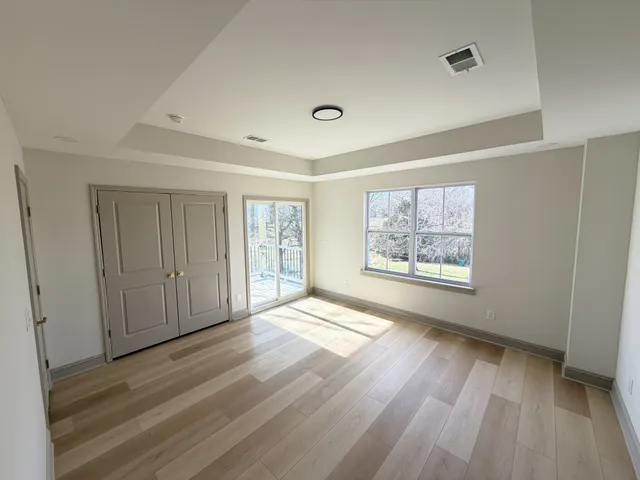 a bathroom with a toilet sink and shower