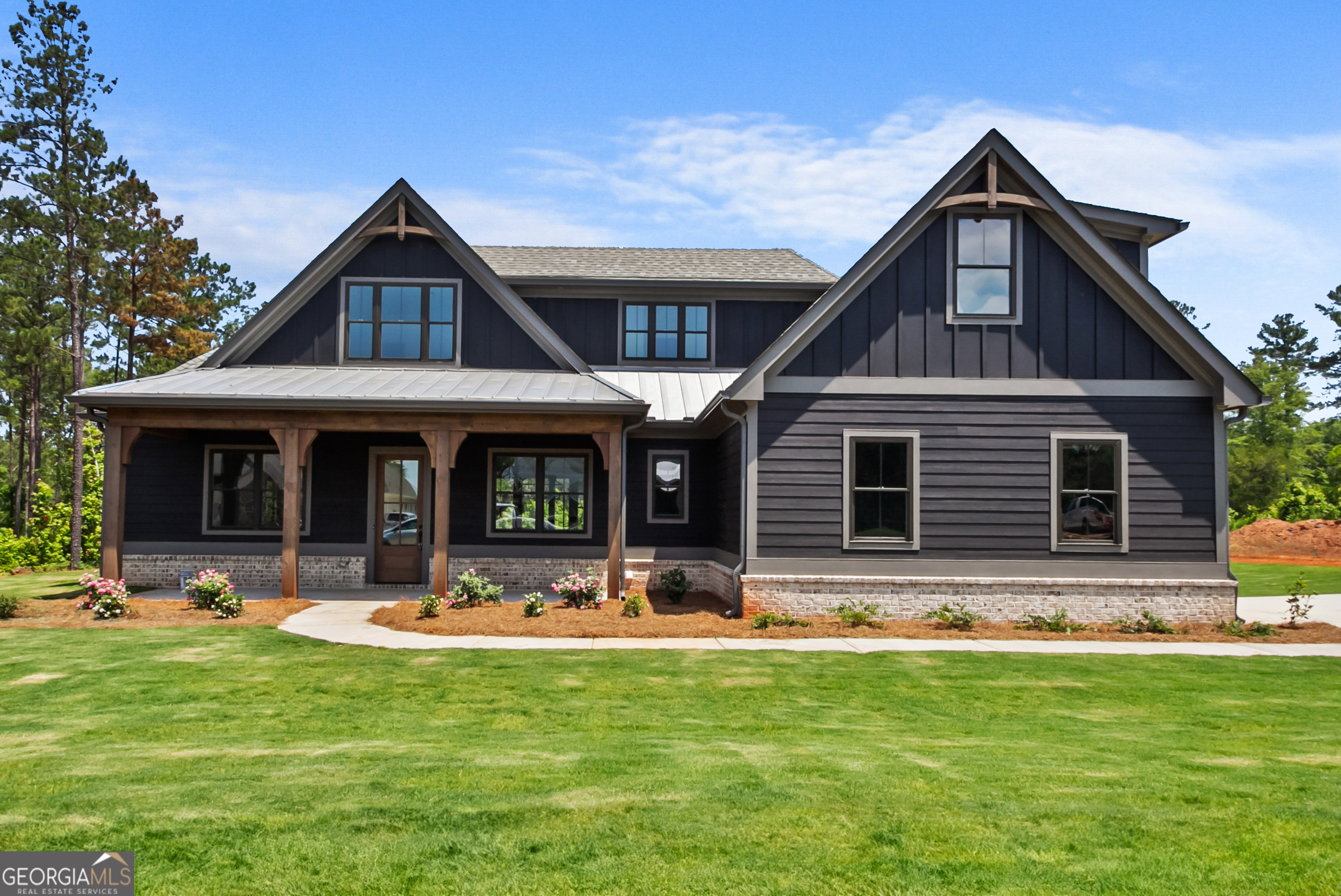 201 Copper Crossing Forsyth, GA 31029 - Photo 1 of 1 a front view of house with yard outdoor seating and yard