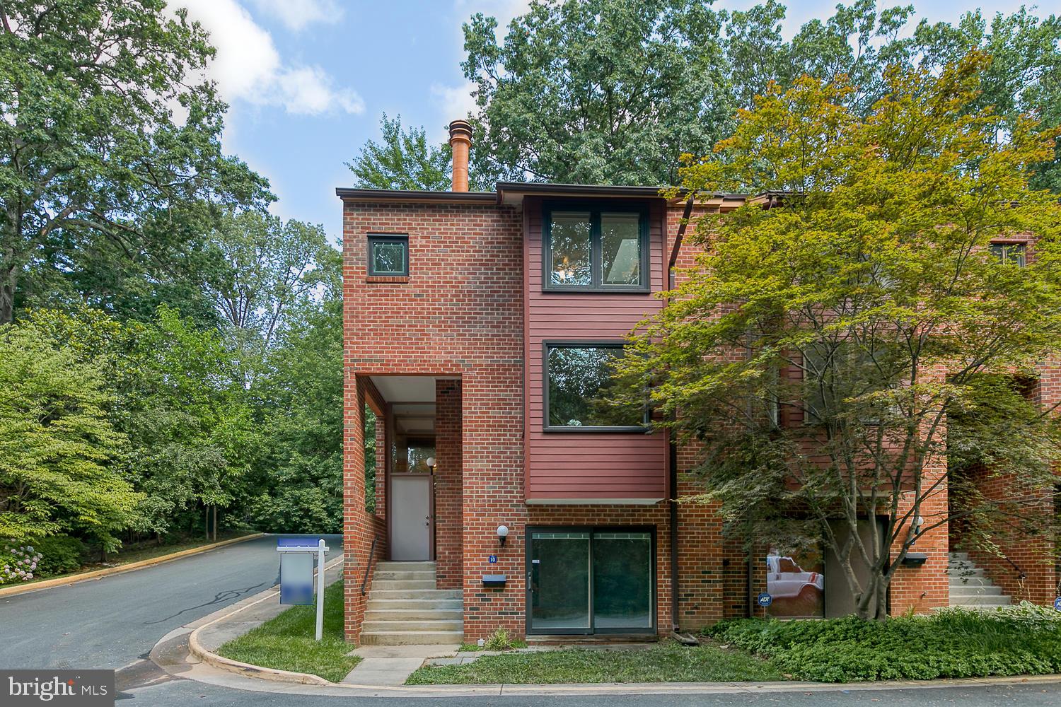 11510 Sunder Court Reston, VA 20190 - Photo 1 of 50 Contemporary 3-story end-unit brick townhouse!