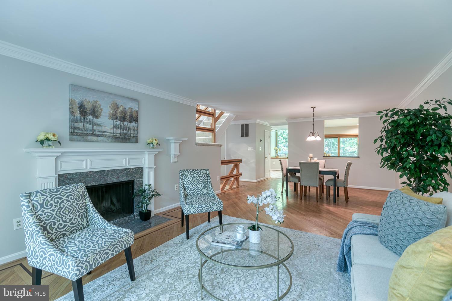 11510 Sunder Court Reston, VA 20190 - Photo 19 of 50 Living room with wood-burning fireplace
