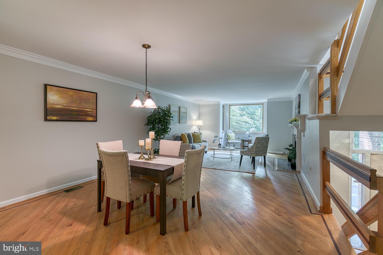 11510 Sunder Court Reston, VA 20190 - Photo 20 of 50 Open living and dining room w hardwood floors
