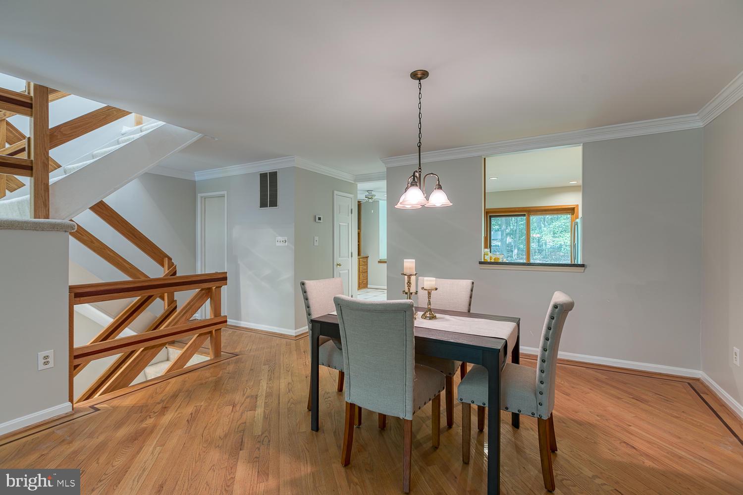 11510 Sunder Court Reston, VA 20190 - Photo 22 of 50 Open living and dining room w hardwood floors