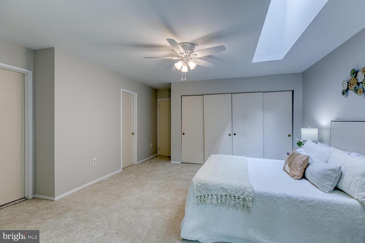 11510 Sunder Court Reston, VA 20190 - Photo 28 of 50 En suite master bedroom w walk-in closet, skylight