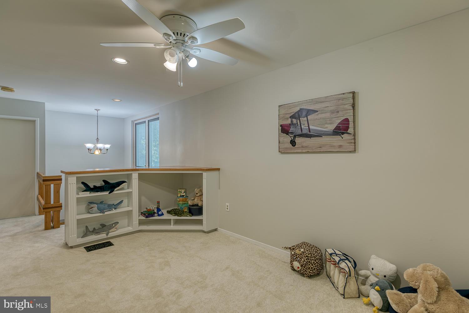 11510 Sunder Court Reston, VA 20190 - Photo 34 of 50 Upper-lvl sitting room w/ window seat & built-ins
