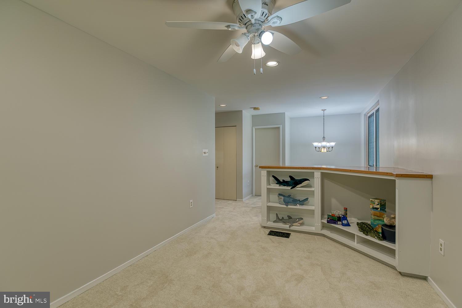11510 Sunder Court Reston, VA 20190 - Photo 35 of 50 Upper-lvl sitting room w/ window seat & built-ins