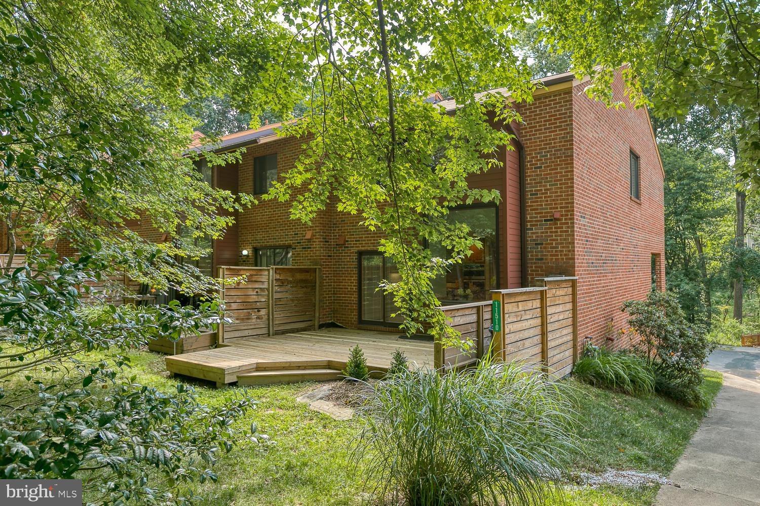 11510 Sunder Court Reston, VA 20190 - Photo 46 of 50 End-unit brick townhouse surrounded by trees