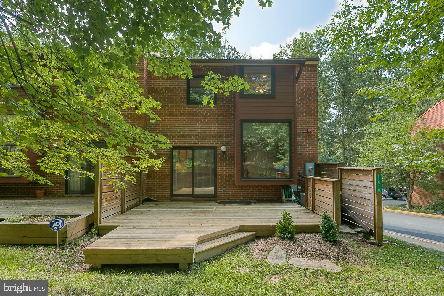 11510 Sunder Court Reston, VA 20190 - Photo 9 of 50 Private patio/deck off kitchen overlooks trees