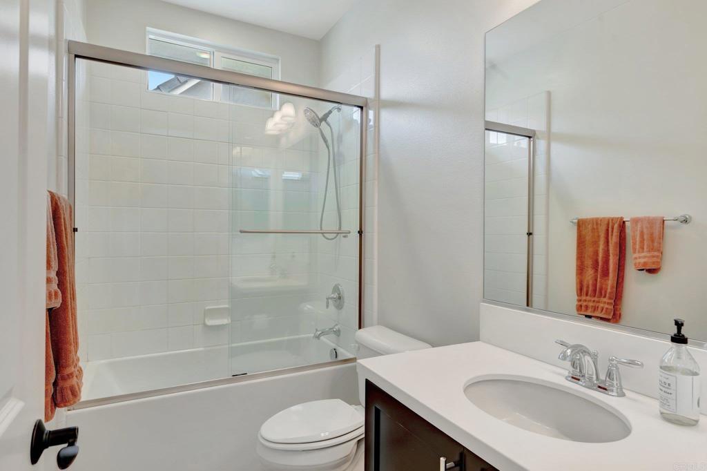 2954 Fledgling Drive Escondido, CA 92029 - Photo 25 of 49 a bathroom with a sink a toilet and shower