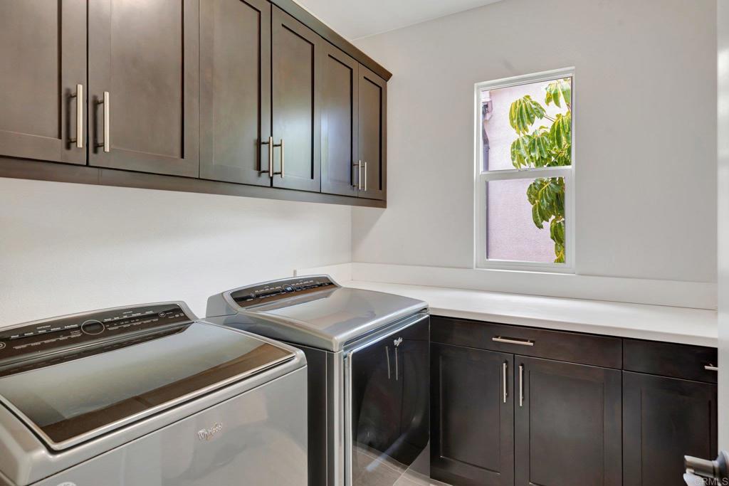 2954 Fledgling Drive Escondido, CA 92029 - Photo 29 of 49 a utility room with dryer and washer