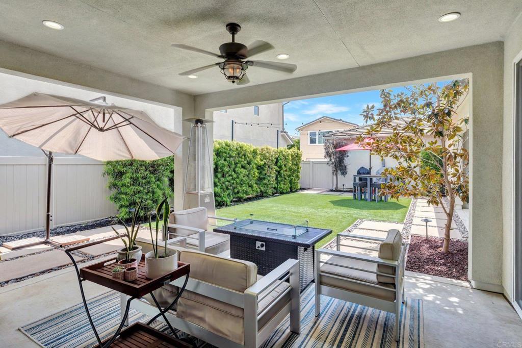 2954 Fledgling Drive Escondido, CA 92029 - Photo 30 of 49 a view of a dining room with furniture window and wooden floor