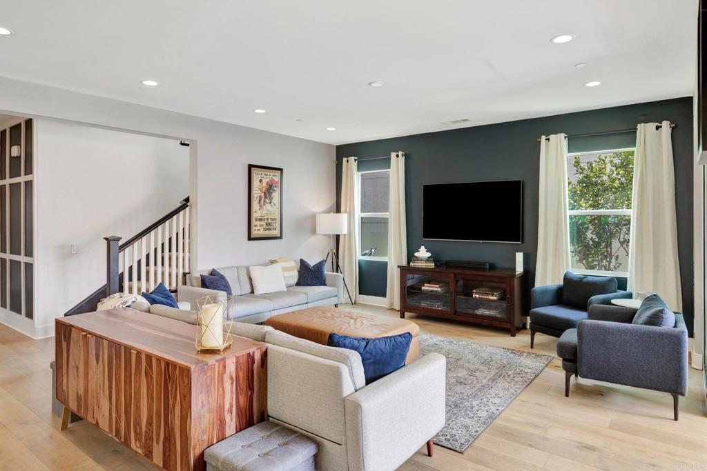 2954 Fledgling Drive Escondido, CA 92029 - Photo 3 of 49 a living room with furniture and a flat screen tv