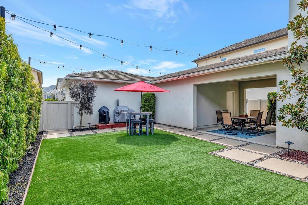 2954 Fledgling Drive Escondido, CA 92029 - Photo 32 of 49 a view of a chairs and table in front of house
