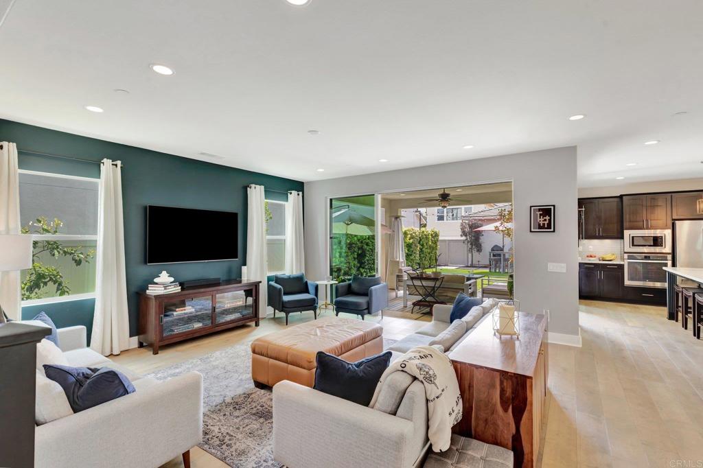 2954 Fledgling Drive Escondido, CA 92029 - Photo 4 of 49 a living room with furniture and a flat screen tv