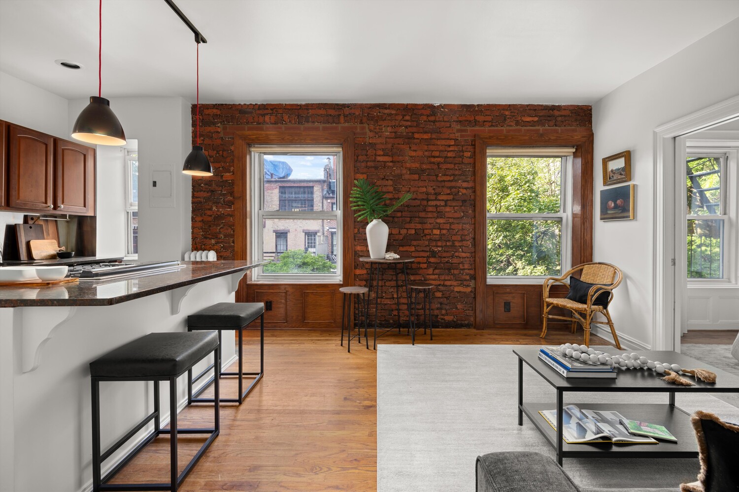 25 Charles Street, Unit 3D Manhattan, NY 10014 - Photo 11 of 13 a living room with furniture and a window