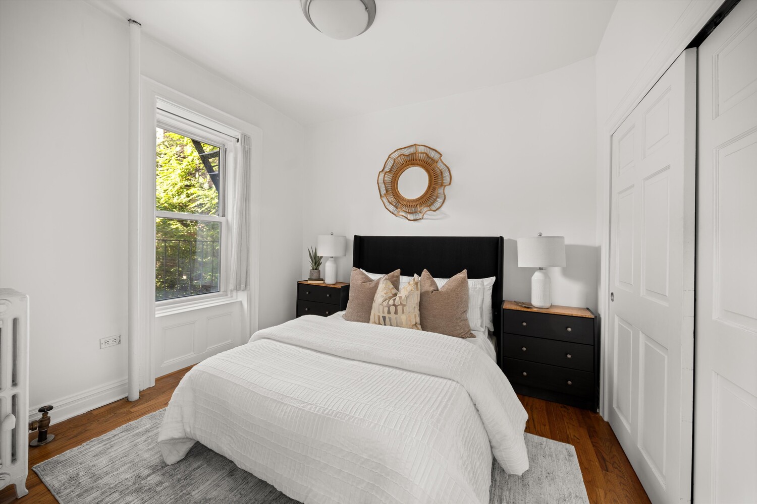 25 Charles Street, Unit 3D Manhattan, NY 10014 - Photo 8 of 13 a bedroom with a bed and window