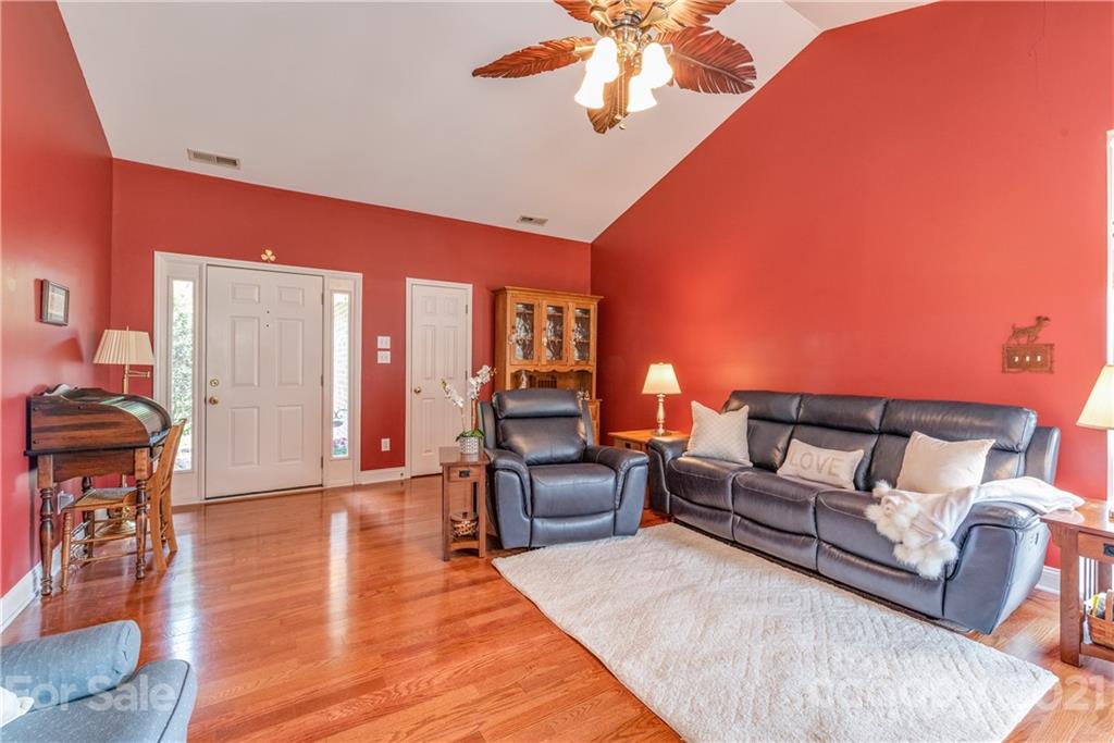 1508 Tom Helms Road Monroe, NC 28110 - Photo 5 of 23 a living room with furniture and a wooden floor