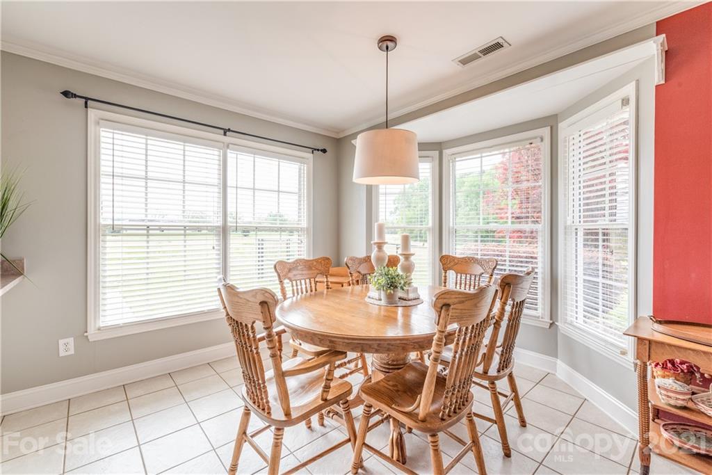 1508 Tom Helms Road Monroe, NC 28110 - Photo 7 of 23 a dining room with furniture and window