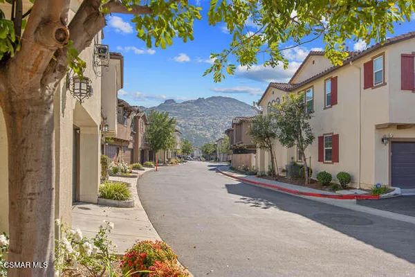 a view of a street with a house