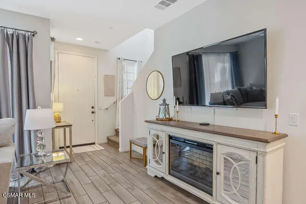 a spacious bathroom with a double vanity sink and a mirror