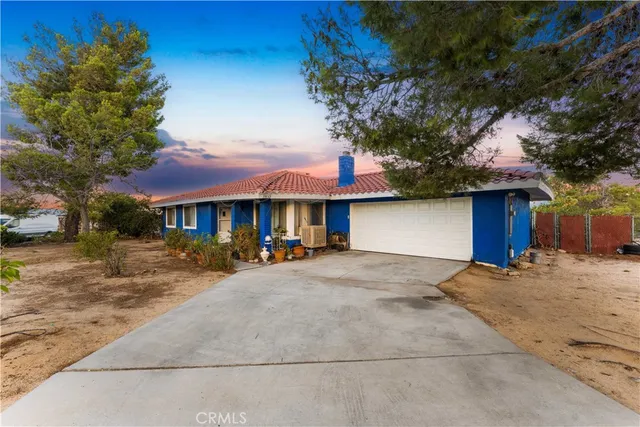 a living room with furniture and a fireplace or television