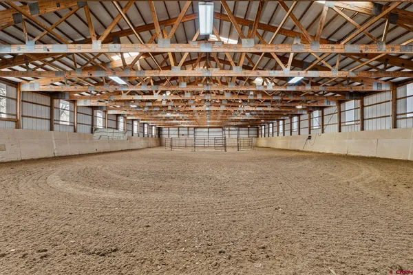 a view of yard with large trees