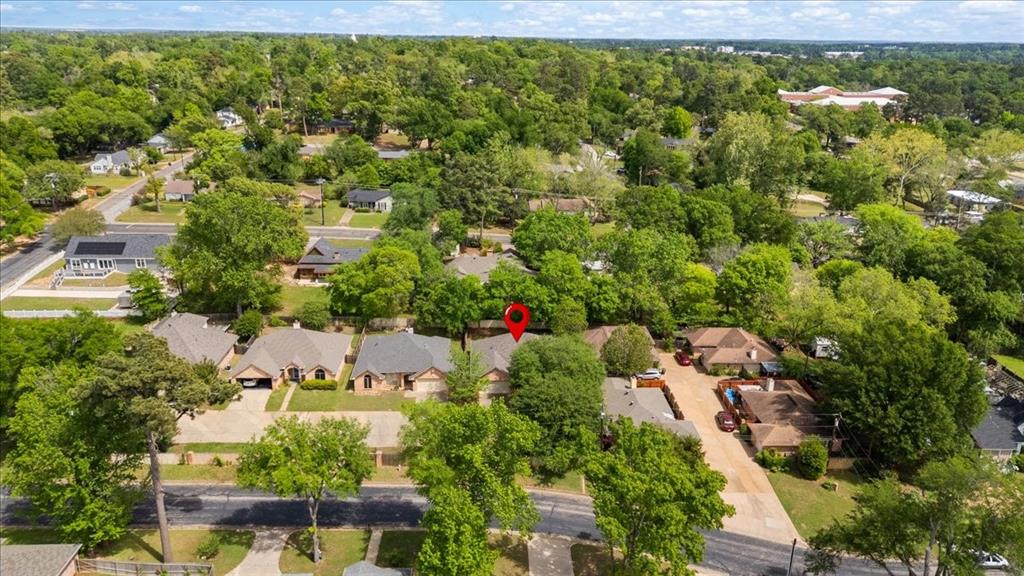 2824 Crestview Avenue Tyler, TX 75701 - Photo 37 of 39 an aerial view of residential house with outdoor space and trees all around