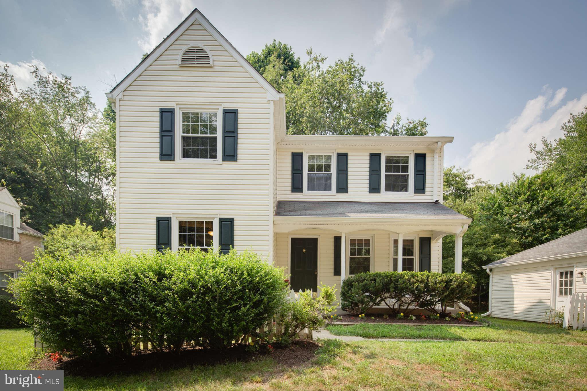 7330 Kindler Road Columbia, MD 21046 - Photo 2 of 28 a front view of a house with a yard
