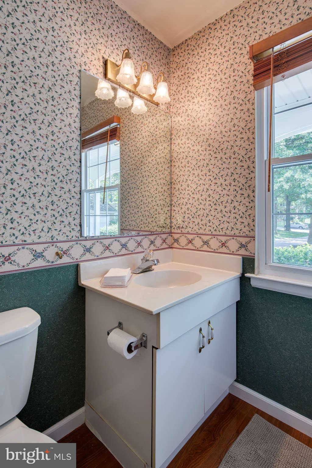 7330 Kindler Road Columbia, MD 21046 - Photo 12 of 28 a bathroom with a sink and a mirror