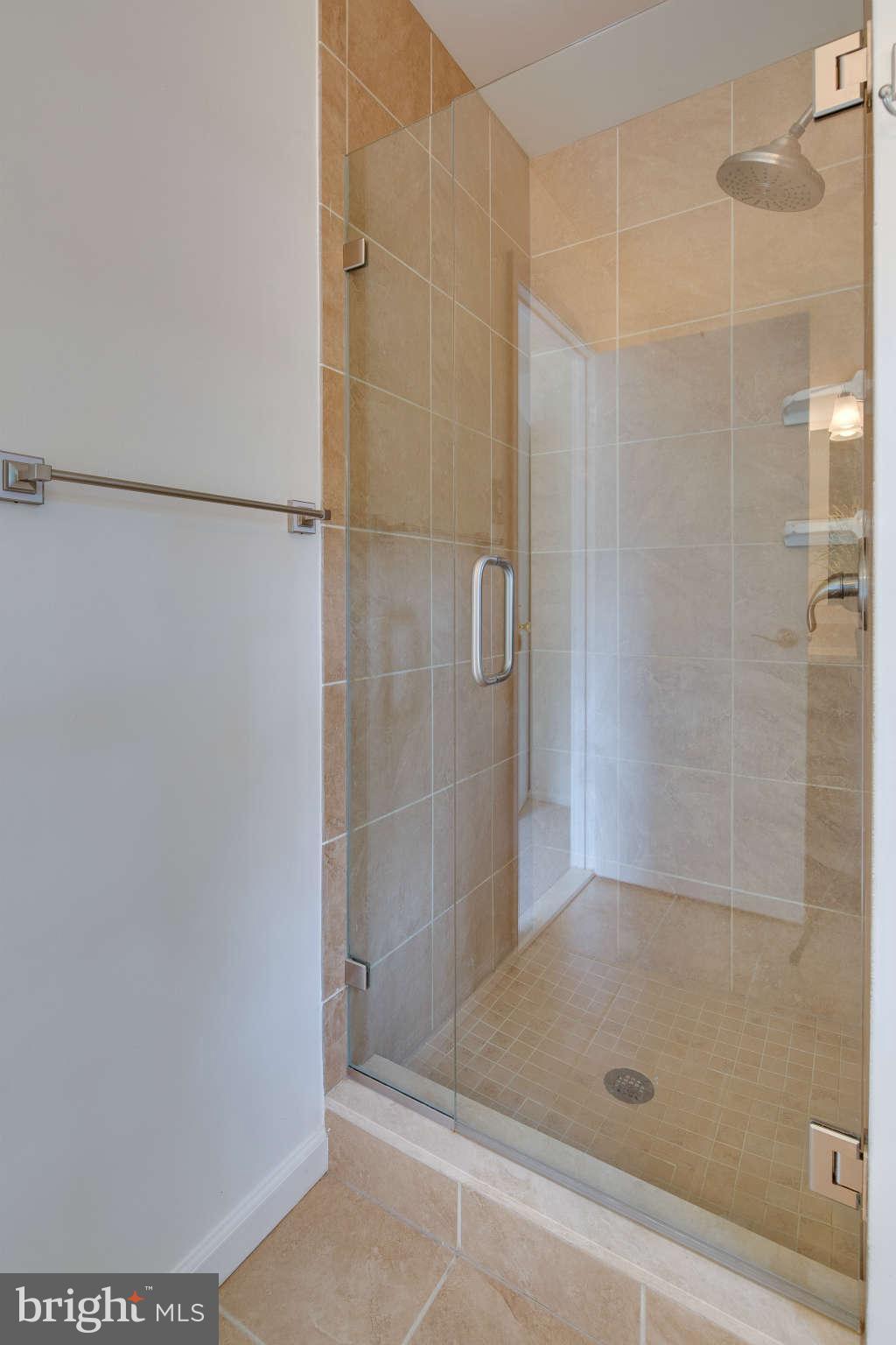 7330 Kindler Road Columbia, MD 21046 - Photo 16 of 28 a bathroom with a shower