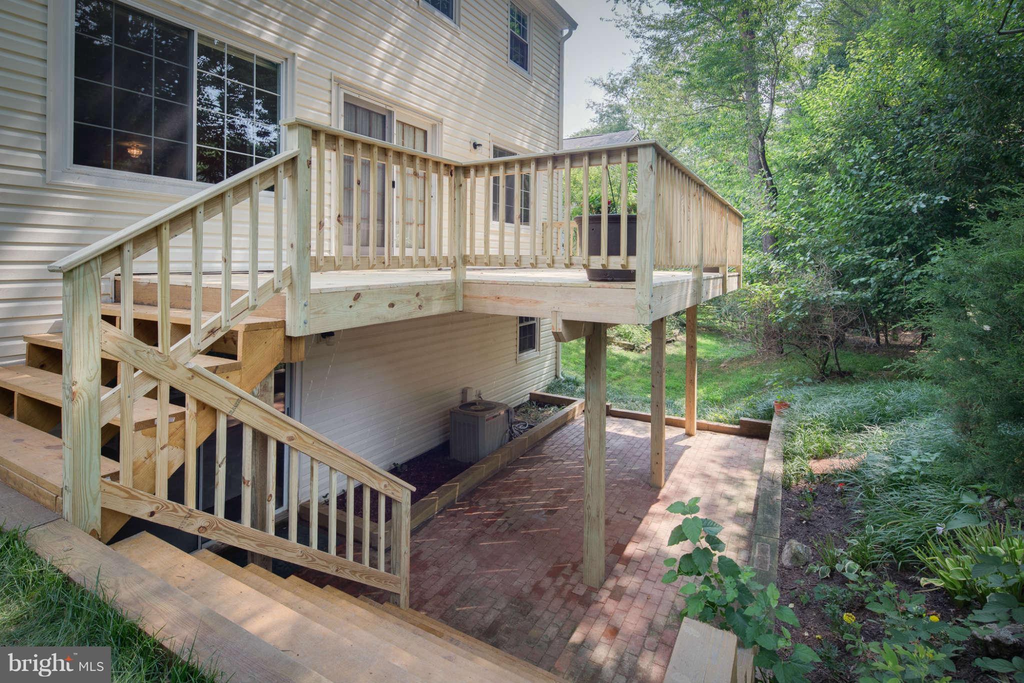 7330 Kindler Road Columbia, MD 21046 - Photo 28 of 28 a view of balcony with deck and wooden floor