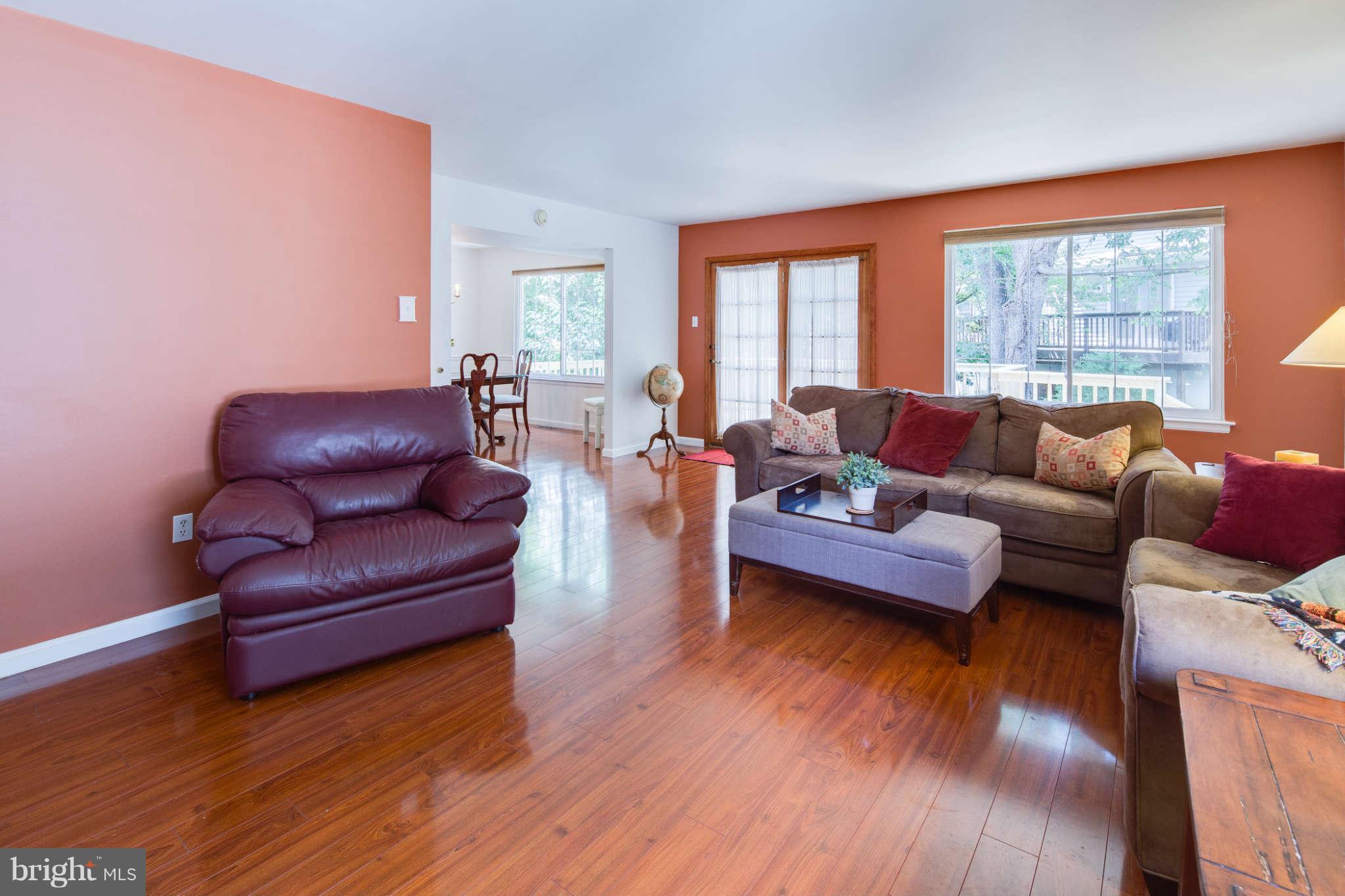 7330 Kindler Road Columbia, MD 21046 - Photo 4 of 28 a living room with furniture and wooden floor