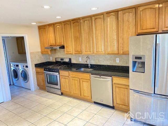 220 Westgate Drive Edison, NJ 08820 - Photo 2 of 19 a kitchen with stainless steel appliances granite countertop a stove a sink and a refrigerator