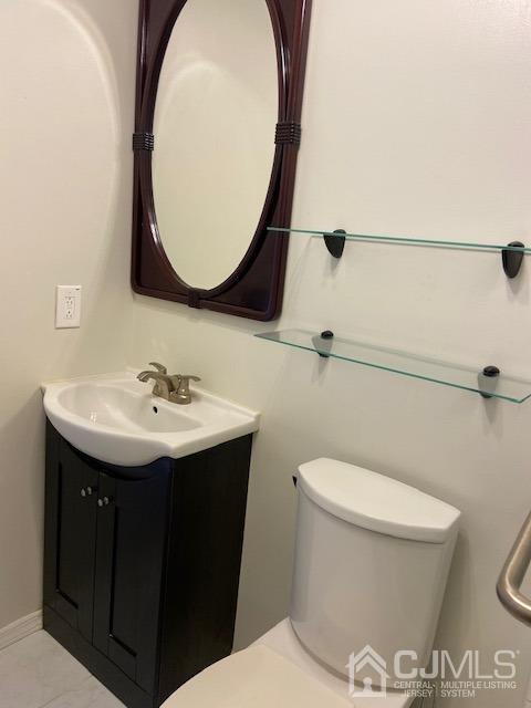 220 Westgate Drive Edison, NJ 08820 - Photo 13 of 19 a bathroom with a sink and a mirror