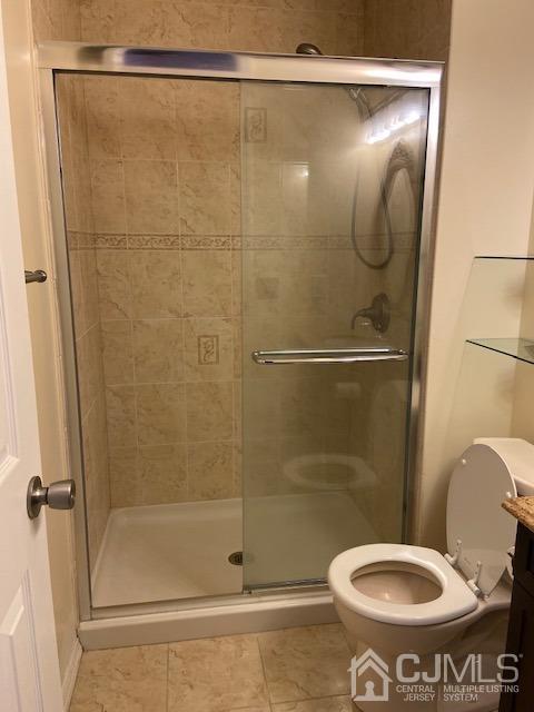 220 Westgate Drive Edison, NJ 08820 - Photo 16 of 19 a bathroom with a shower and a toilet