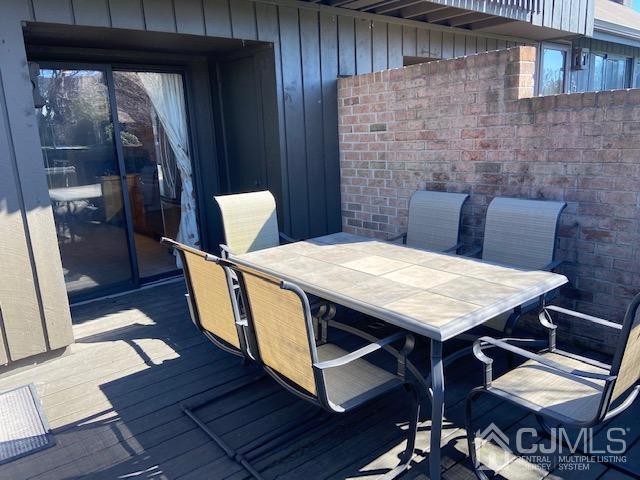 220 Westgate Drive Edison, NJ 08820 - Photo 19 of 19 a dining room with furniture a rug and wooden floor