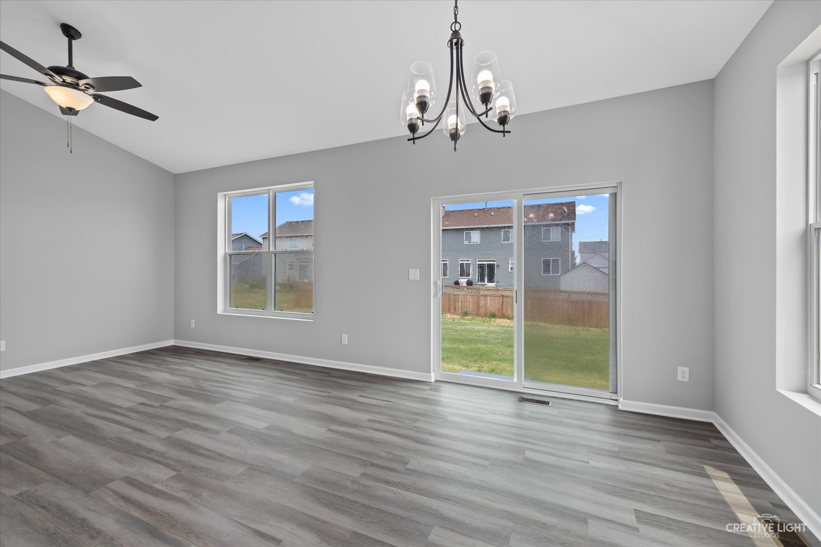 534 Hahn Drive Cortland, IL 60112 - Photo 6 of 32 a view of empty room with wooden floor