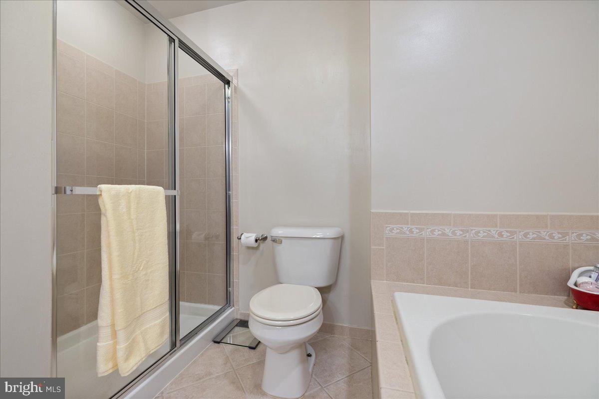211 Barness Lane Chalfont, PA 18914 - Photo 16 of 32 a bathroom with a toilet and a shower